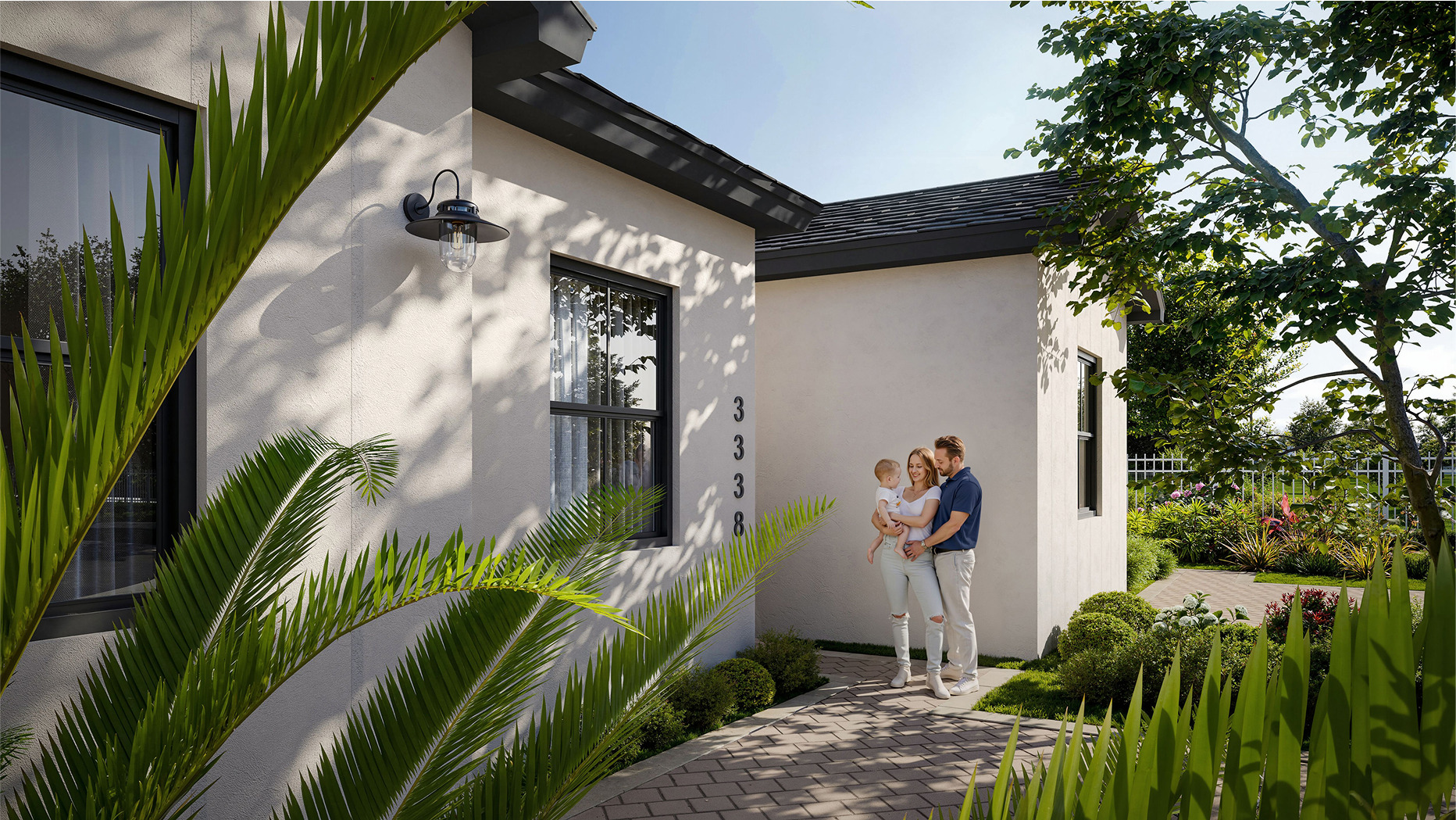 Parents with child standing outside modern home surrounded by greenery